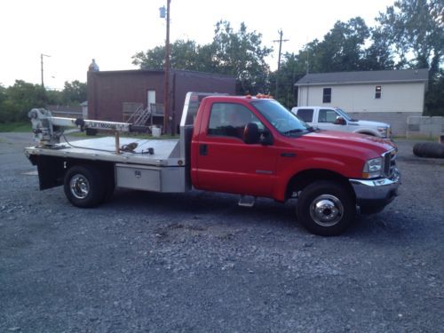 F-350 4x4 with 6.0 diesel engine, aluminum bed, gooseneck hitch, mechanics boom