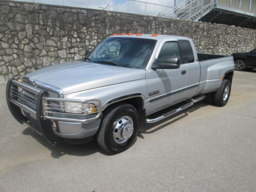 Low mileage 5.9 liter cummins turbo diesel slt laramie dually  clean car fax