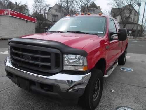 F 350 auto ext cab 4x4 highway miles runs great! no reserve 8 foot bed!
