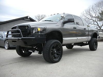 06 ram 3500 laramie~4x4~5.9l cummins~4x4~big lifted~lots of mods~wheels~carfax!!