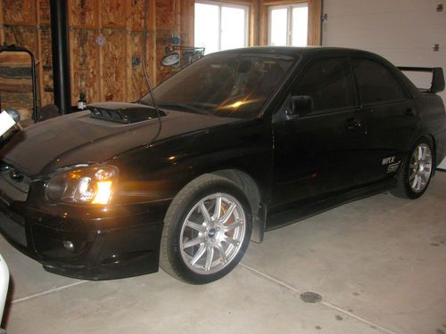 2004 black subaru sti