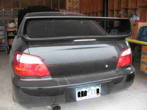 2004 black subaru sti, image 2