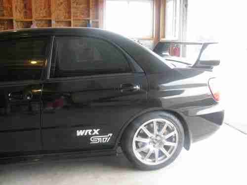 2004 black subaru sti, image 3