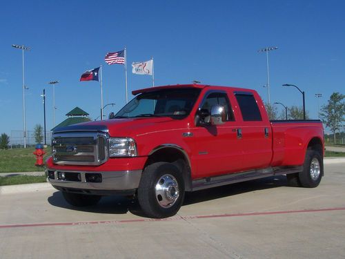 Low milage, 2005 ,ford f350 lariat , dually , crew cab,  8' bed,loaded