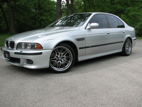 2001 bmw m5 silver on black, 6-speed 400hp head turner. looks and runs good!