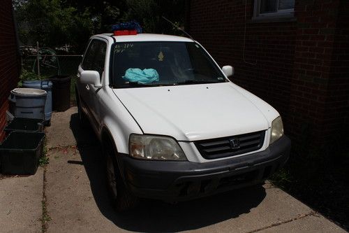 White 2001 honda crv recently rear-ended selling as is still runs