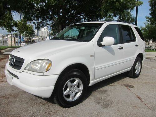 Beautiful ml320 with only 76k actual miles awd navigation very clean &amp; serviced
