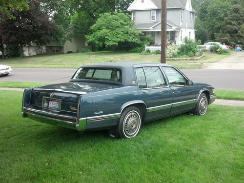 1992 caddy deville in above avg. condition with low miles,one of a kind
