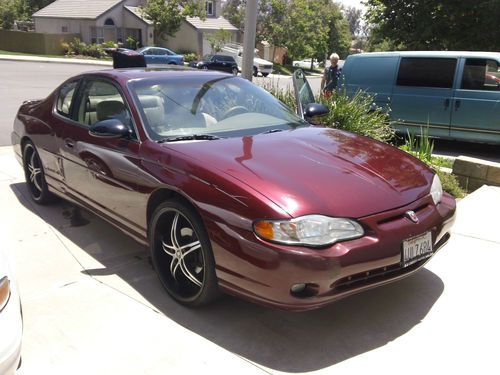2002 chevy monte carlo ss with 22 rims.