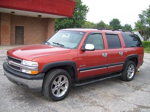 Chevrolet suburban 3rd row seating 4x4 burnt orange 20" rims third wheels chevy