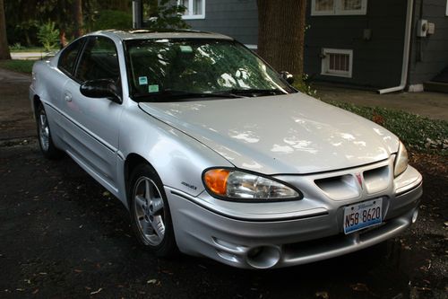 2002 silver pontiac grandam coupe with spoiler