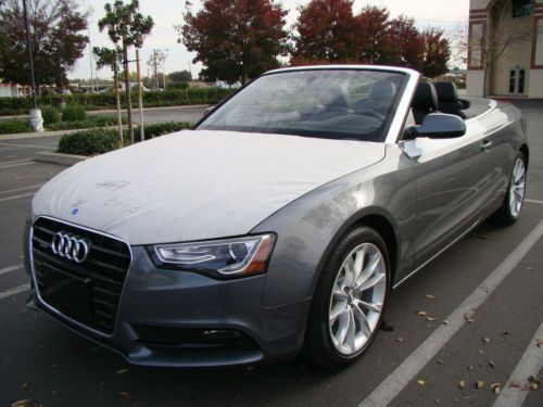 2014 audi a5 premium quattro convertible in new condition, only 30 mi.