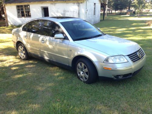 Metalic silver awd v6 passat  25 mpg