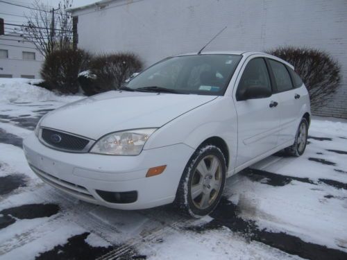 05 06 07 ford focus zx5, hatchb . 4door , automatic . gas saver ,runs great !!!