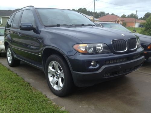 Nice bmw x5 3.0is    one previous owner only 85,000 miles   very clean