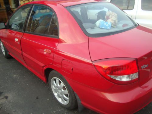 2003 kia rio base sedan 4-door 1.6l cherry red