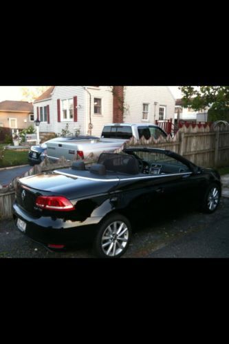 2012 black volkswagen eos hard top convertible in great condition