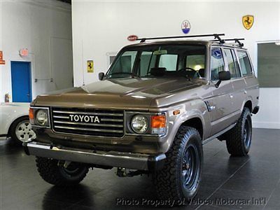 *sweet fj60 *original color *leather interior *33 bfg *mojave rims *old man emu*