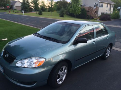 2005 toyota corolla ce green (excellent condition)