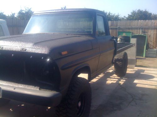 1970 custom black bed lined f100 4x4 flatbed