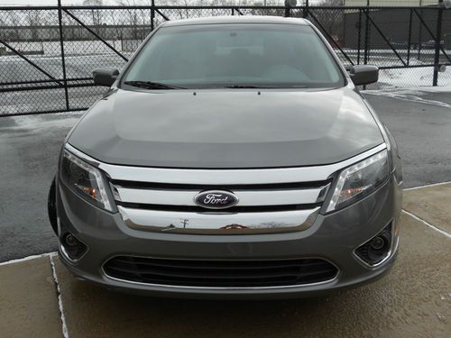 2012 ford fusion sel 2.5liter*no reserve*only 7k*htd leather*led * sync*rebuilt
