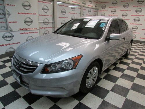 4 cylinder gas saver, accord sedan, silver on black, like new