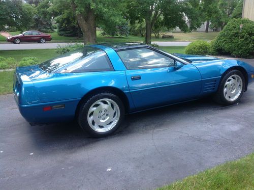 2dr coupe with t/top,16,556 miles beautiful aqua color, 1 owner vehicle