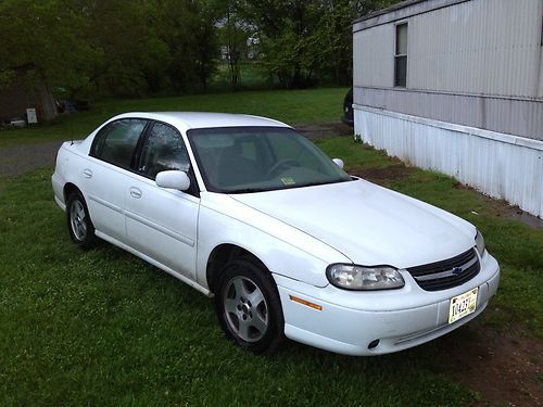 Chevrolet, sedan, white, tan, four door, automatic, cd player, a/c, cruise