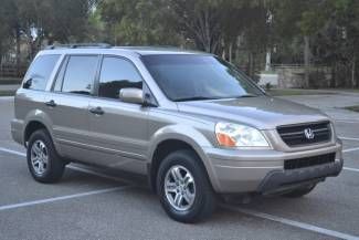 2003 honda pilot exl 4wd gold leather  1-owner runs great ac has leak no reserve