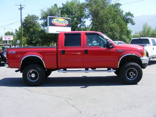 Lifted 2001 ford f-250 super duty xlt crew cab pickup 4-door 7.3l low miles!