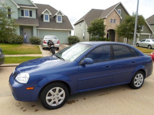 2004 suzuki forenza s sedan 4-door 2.0l