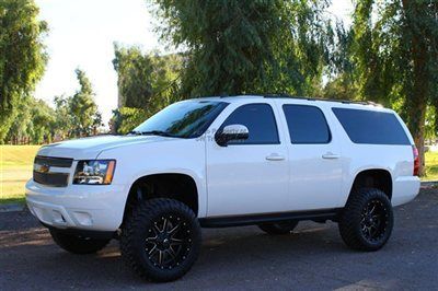 Gorgeous lifted suv with new wheels, new tires, new lift kit, leather, moonroof