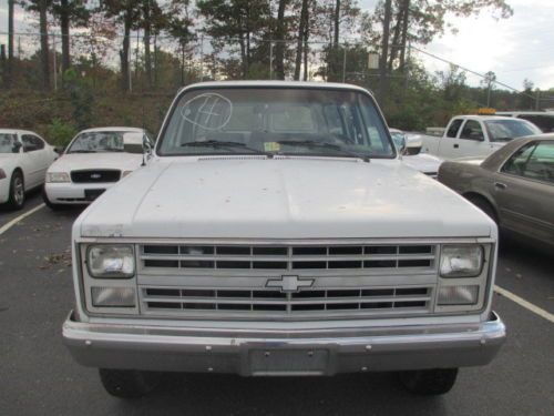 1988 chevrolet suburban 4 wd 70k miles-- govt. surplus-va.