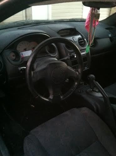 Black color, 2 door, automatic, nitrogen tires, sunroof, cd player,dash cover