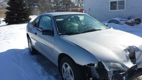 2001 silver chevy cavalier for repair or parts