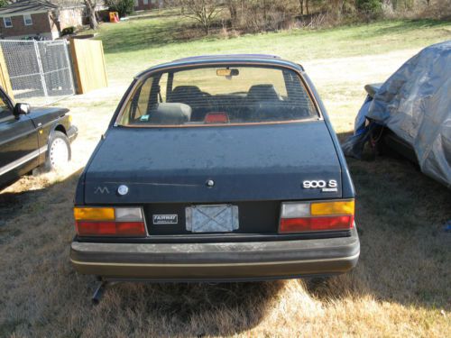 1990 sedan. good engine &amp; 5 speed transmission. runs well. drivers door damaged