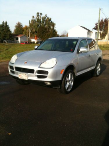 2004 porsche cayenne type s  fully loaded silver blue with black leather inter.