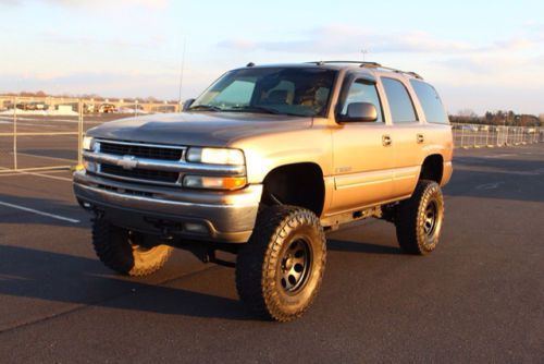 2003 chevy tahoe lt 130k miles, 6in lift, 37in tires, great truck, free warranty