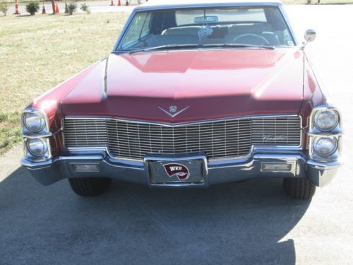 1965 maroon cadillac deville convertible