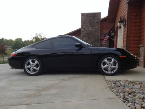 Porsche 911 carerra coupe, auto w/ triptronic, 67k miles, black w/ tan interior