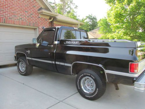 1986 chevrolet silverado c-10, 4wd,black w/ red interior, 26,400 original miles