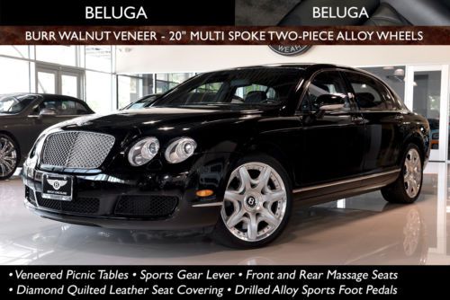 Original msrp $190,875; black/black; burr walnut veneer