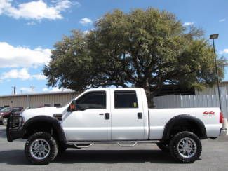 Lifted lariat heated leather sunroof rev cam navigation powerstroke diesel 4x4 !