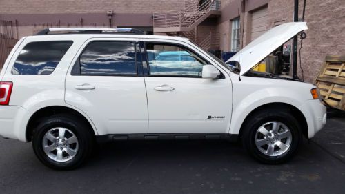 2010 escape hybrid ltd 4wd white suede, one owner