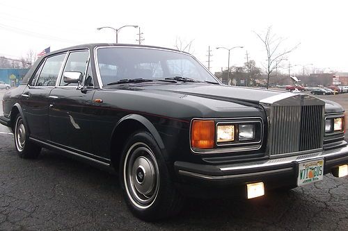 1985 rolls royce silver spur, lwb triple black , books, runs and drives great !!