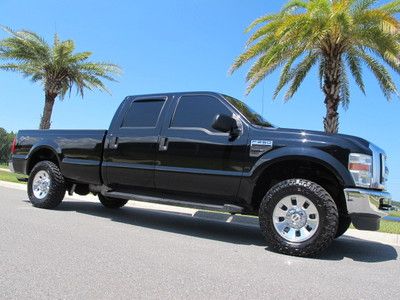 Ford f250 superduty lariat crew cab 4wd long bed chrome wheels extra nice truck!