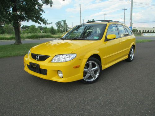 2001 mazda protege 5 stick shift, rare color , crome wheels