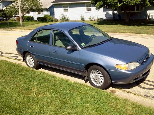 1999 ford escort automatic, clean, low miles, a/c ice cold, great gas mileage.