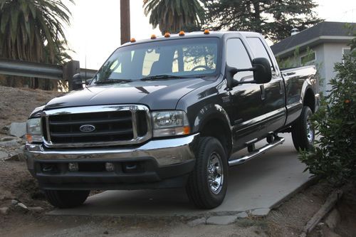 03 ford f-350 crew cab 7.3 powerstroke diesel, 4x4 offroad, 8 ft bed, no reserve