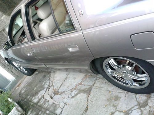 1997 corgous silver caddy deville 60 k gorgous!